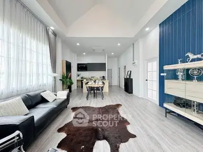 Spacious modern living room with high ceilings and stylish decor