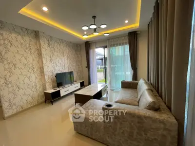 Modern living room with stylish decor and large sofa, perfect for relaxation.