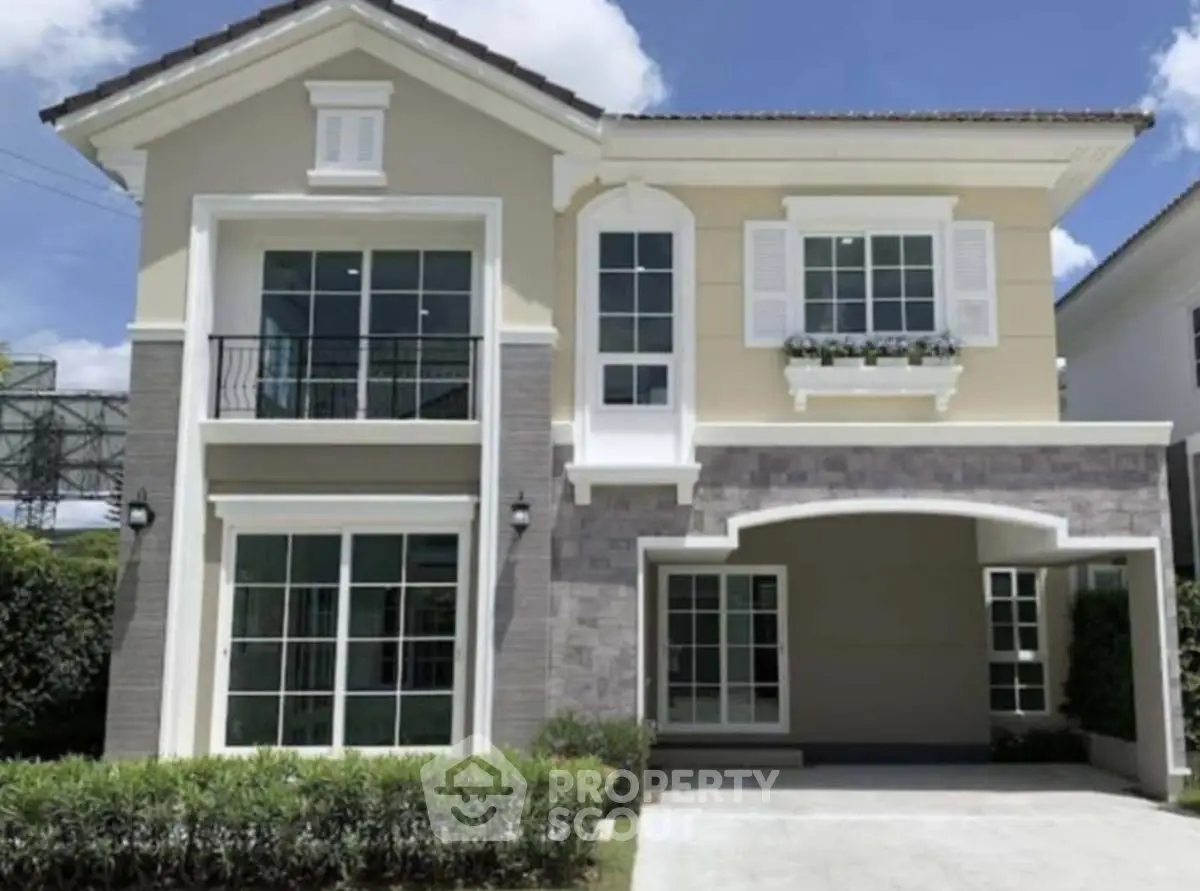 Charming two-story house with modern design and spacious driveway