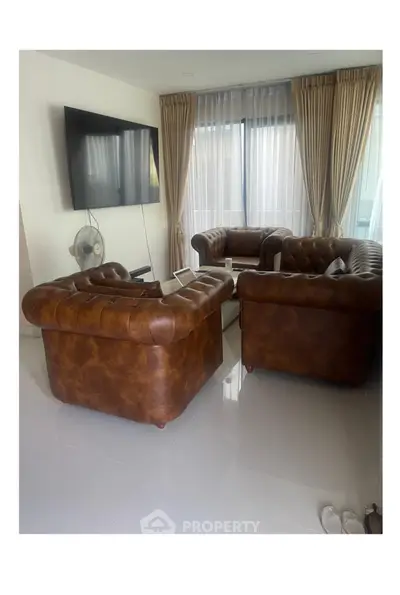 Luxurious living room with elegant leather sofas and modern decor