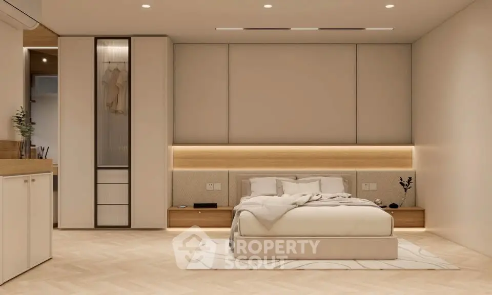 Luxurious modern bedroom with elegant lighting and minimalist design, perfect for relaxation and comfort.