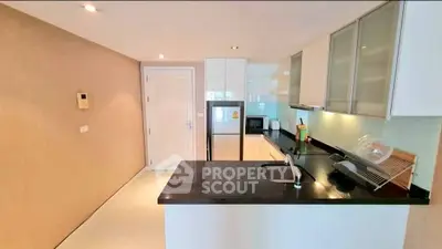 Modern kitchen with sleek design and open layout, featuring high-end appliances and stylish cabinetry.