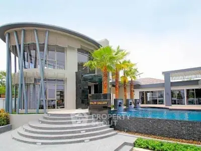 Stunning modern building with unique architecture and pool, perfect for luxury living.