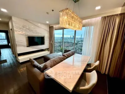 Luxurious living room with panoramic city view and elegant chandelier