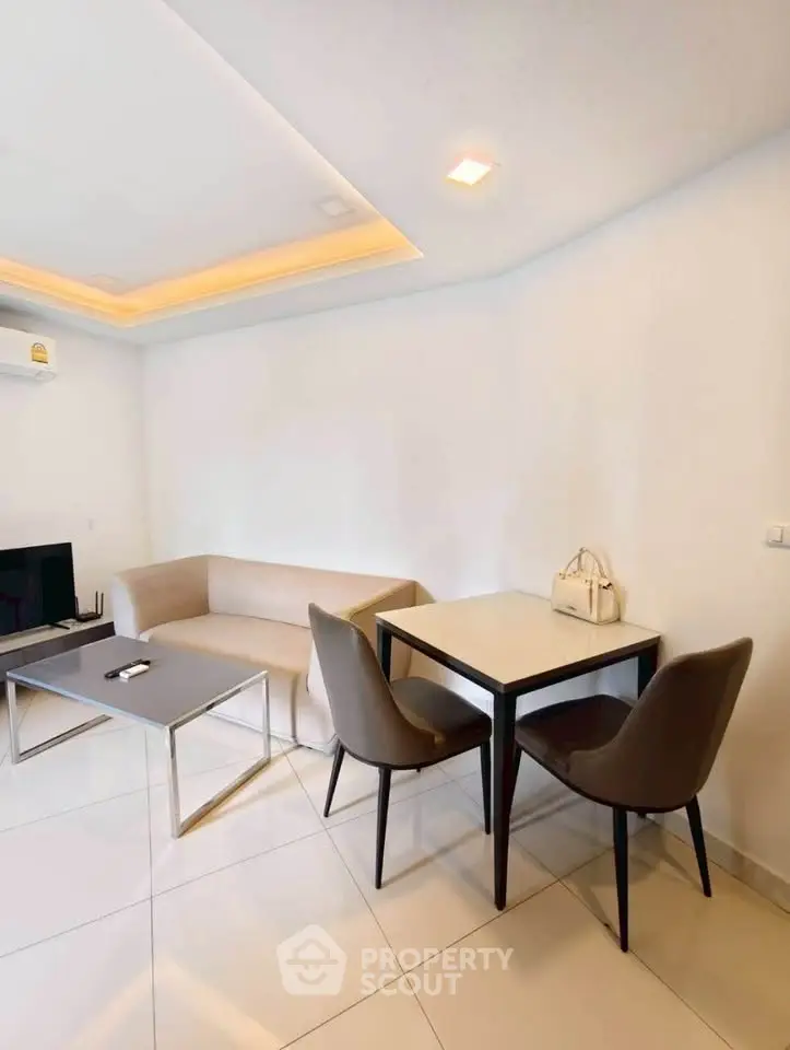Modern living room with sleek furniture and ambient lighting