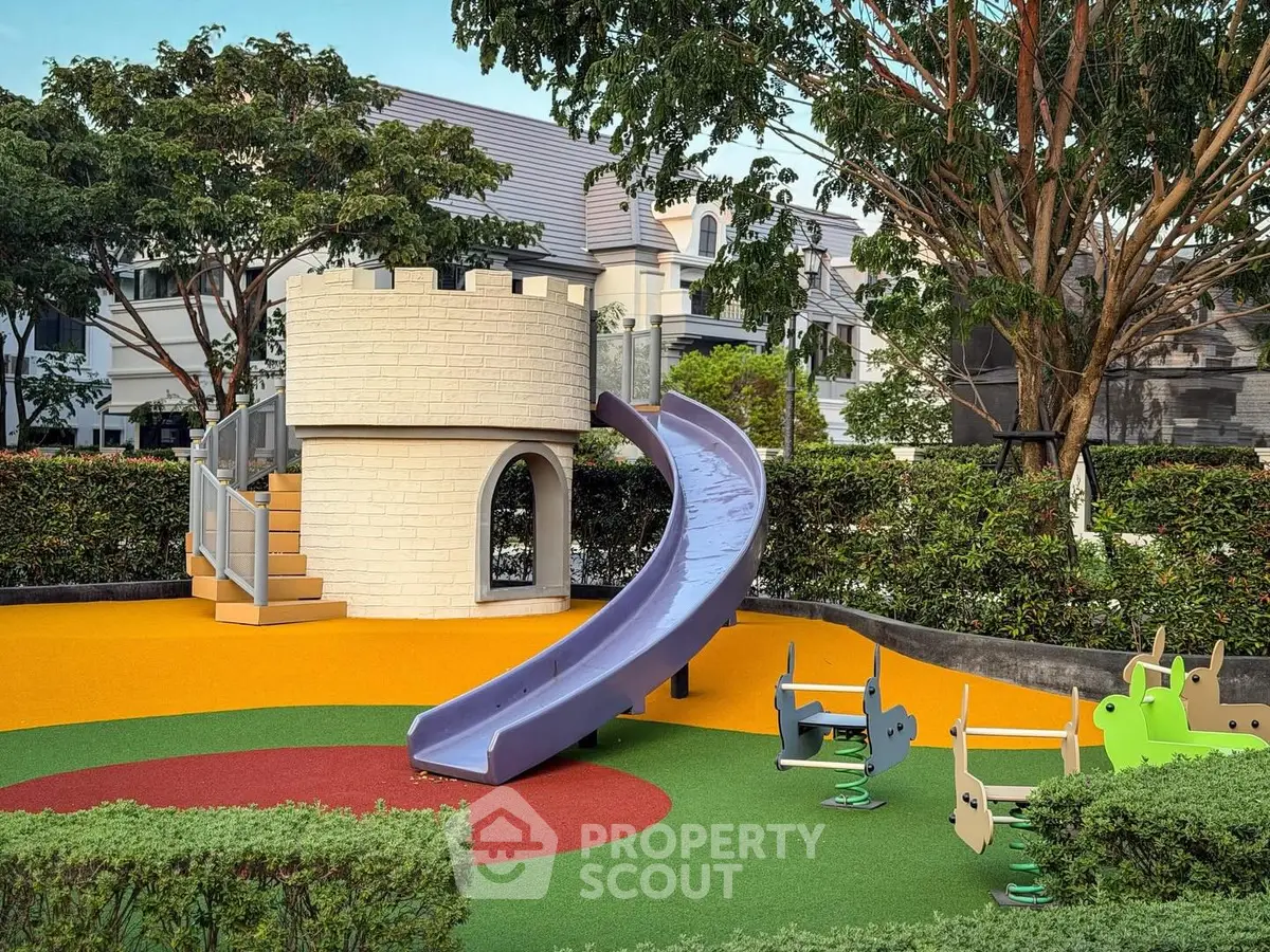 Charming residential playground with slide and colorful play area