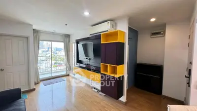 Modern living room with vibrant shelving and city view balcony, perfect for urban living.