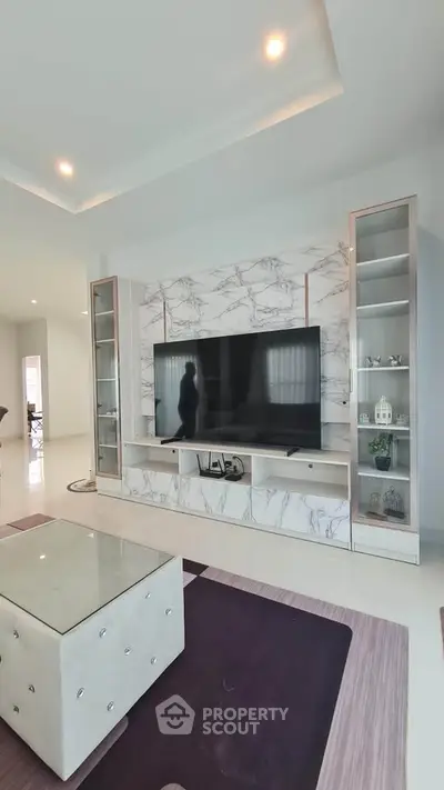 Modern living room with elegant marble TV unit and stylish decor