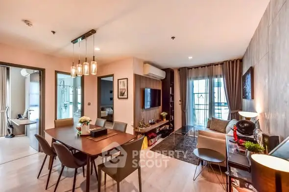 Modern living and dining area with stylish decor and natural light