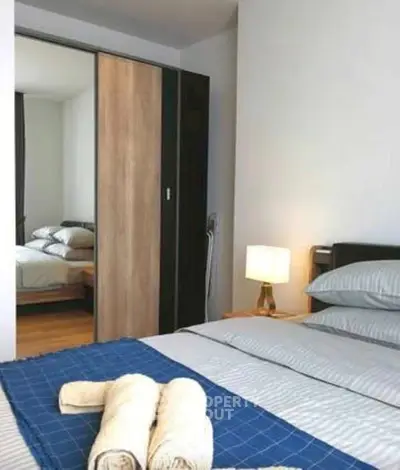 Modern bedroom with stylish decor and cozy ambiance