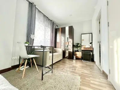 Bright and modern living room with stylish furniture and natural light