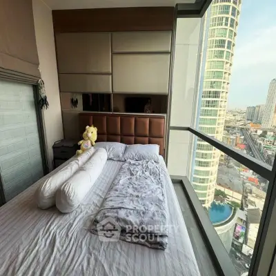 Luxurious bedroom with stunning city view from floor-to-ceiling windows in high-rise apartment.