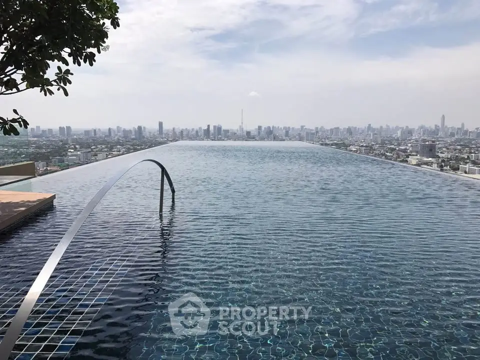 Stunning infinity pool with breathtaking city skyline view