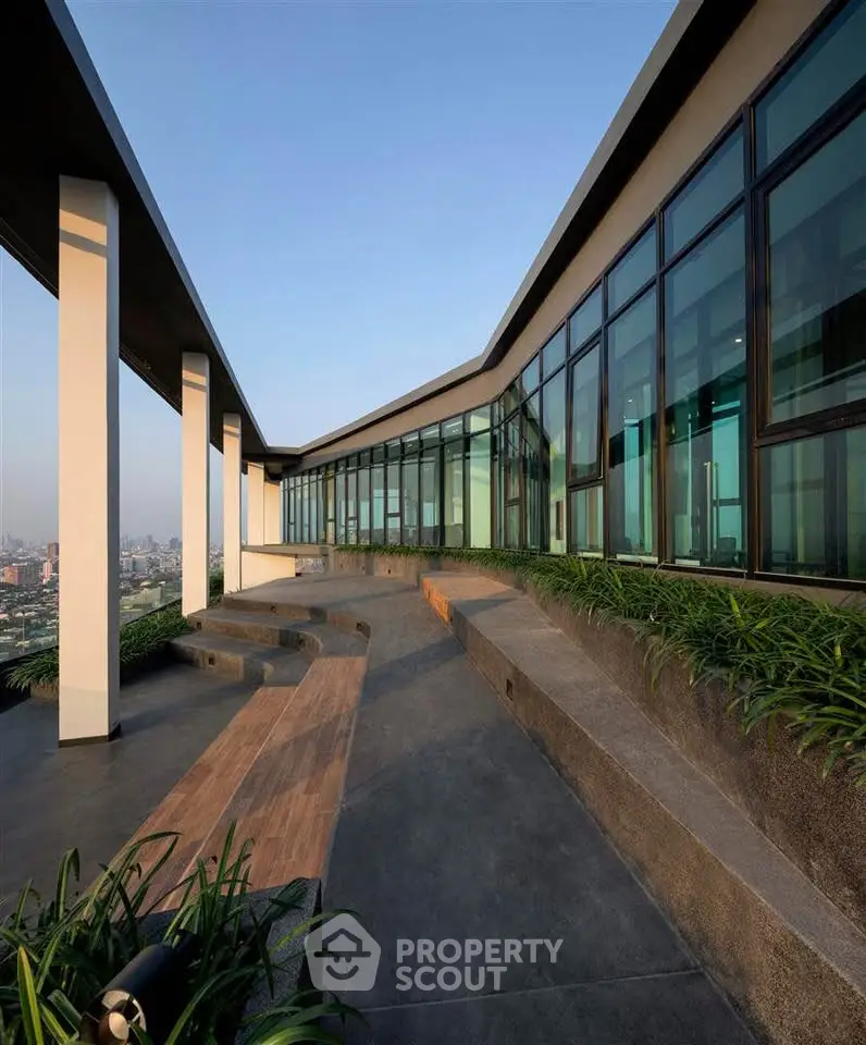 Stunning rooftop terrace with panoramic city views and modern architectural design.