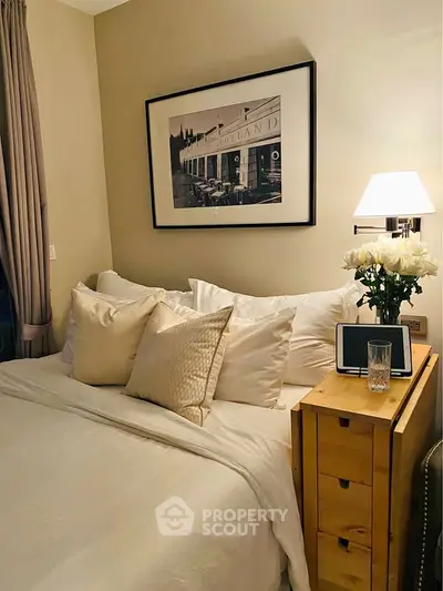 Cozy bedroom with elegant decor and soft lighting, perfect for relaxation.