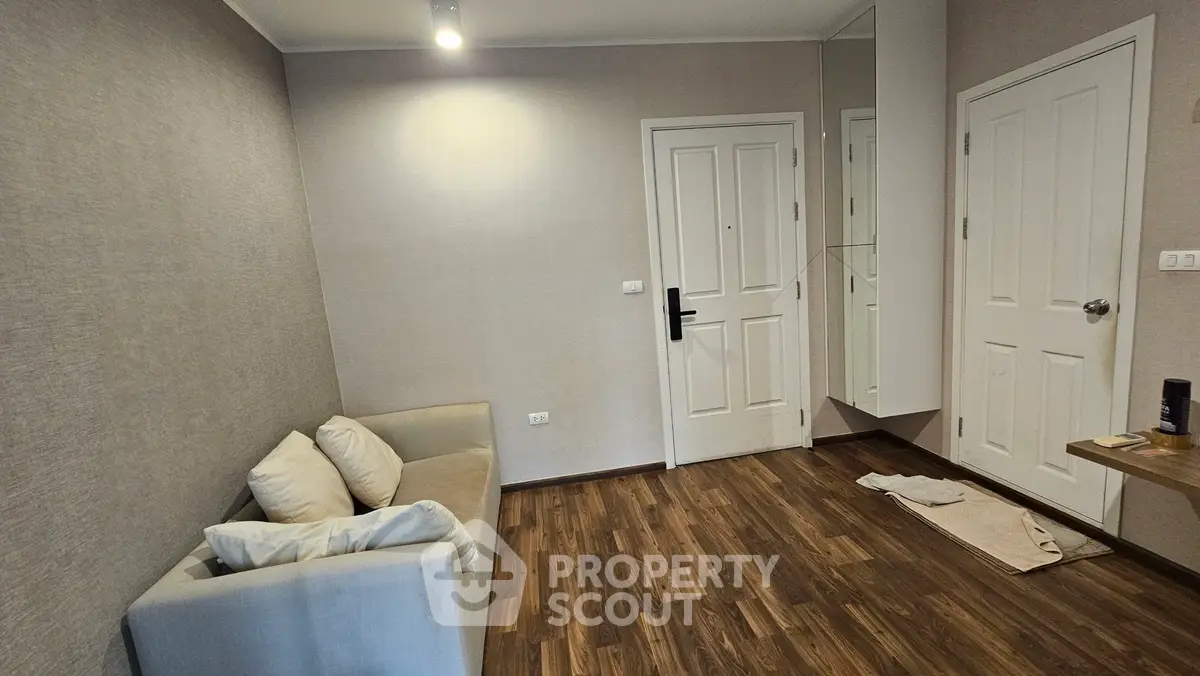 Cozy living room with modern decor and wooden flooring