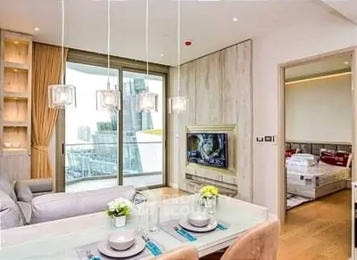 Modern living room with open layout, stylish decor, and city view balcony in luxury apartment.