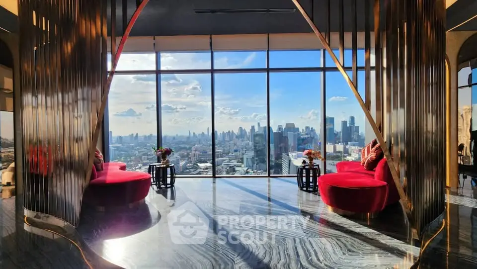 Luxurious high-rise living room with panoramic city skyline view and elegant modern decor.