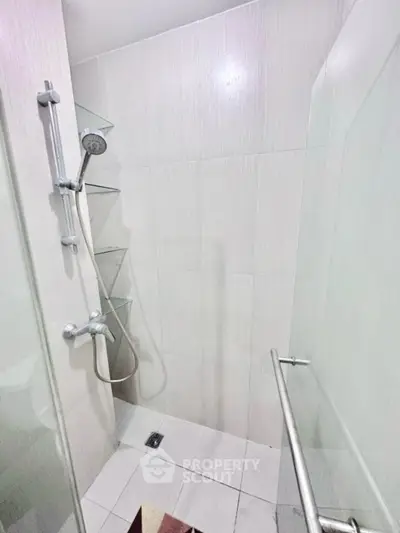 Modern bathroom with sleek shower design and glass door