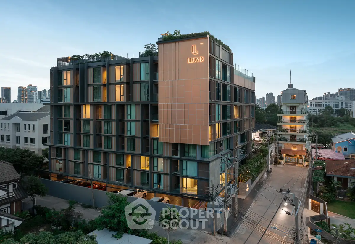 Modern luxury apartment building with rooftop garden and city skyline view