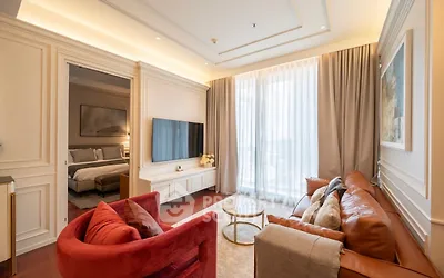 Luxurious living room with elegant decor and large windows in modern apartment