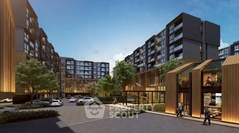 Modern apartment complex with stylish architecture and lush landscaping.