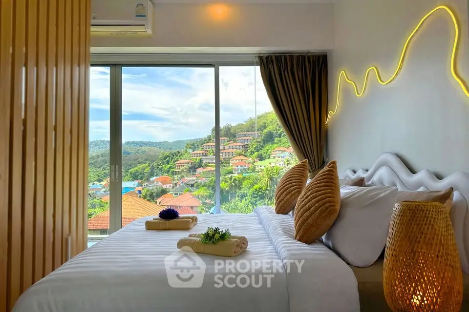 Luxurious bedroom with stunning hillside view and modern decor