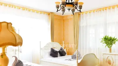 Elegant bedroom with classic decor and natural light