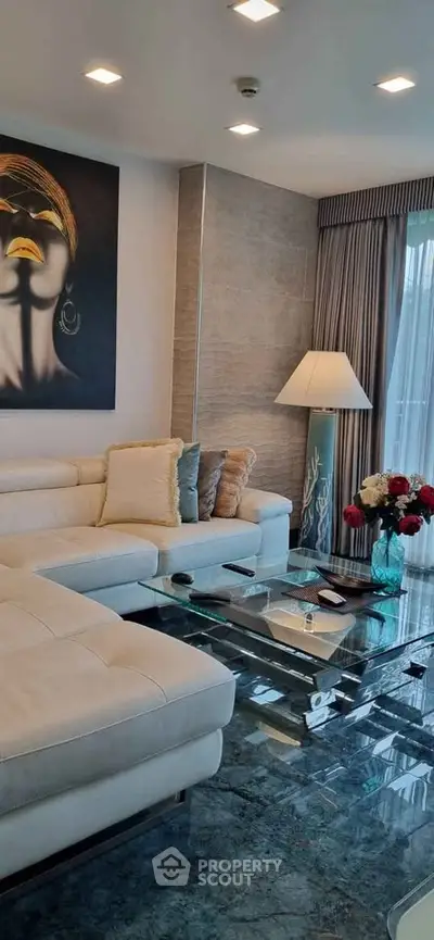 Luxurious living room with modern art and elegant decor