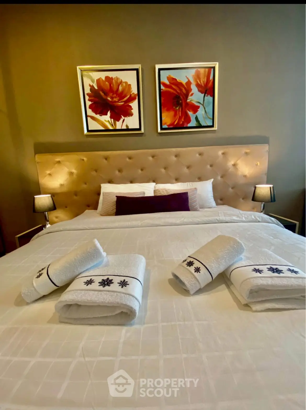 Luxurious bedroom with elegant decor and plush bedding, perfect for relaxation and comfort.