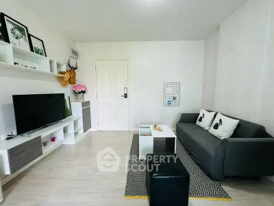 Modern living room with sleek decor and stylish furniture, perfect for comfortable living.