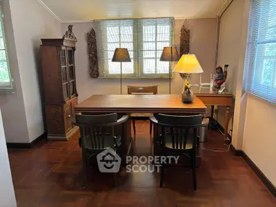 Charming study room with wooden furniture and natural light