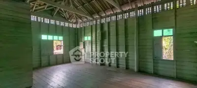 Spacious wooden interior with rustic charm and natural light