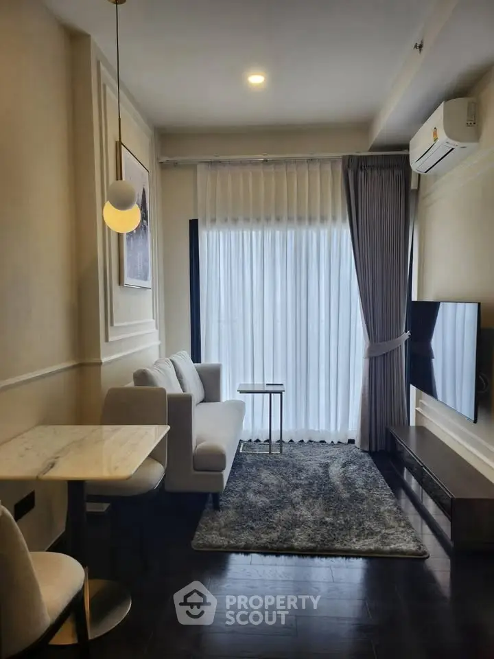 Chic modern living room with elegant decor and natural light, perfect for urban living.