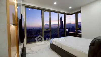 Luxurious bedroom with stunning city view and modern decor