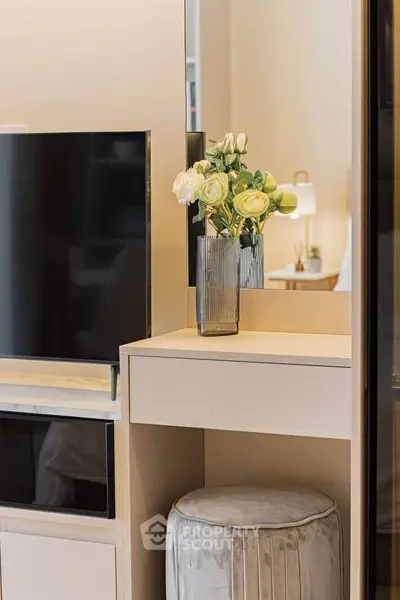 Modern living room with sleek TV stand and elegant decor