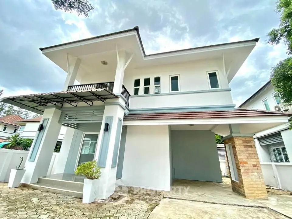 Stunning two-story modern house with spacious driveway and elegant facade.