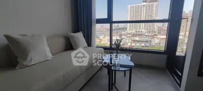 Modern living room with city view and stylish furniture