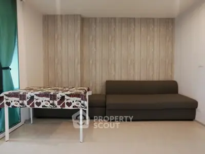 Cozy living room with modern sofa and stylish table in a bright apartment