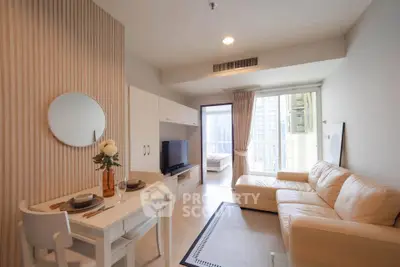 Modern living room with cozy seating and dining area, featuring a large window with city view.