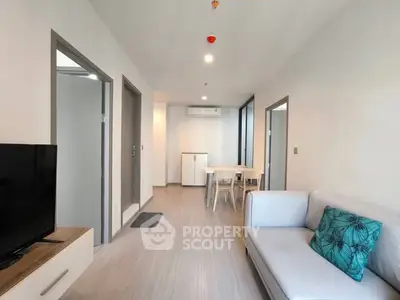 Modern living room with sleek furniture and open layout, perfect for contemporary living.