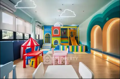 Vibrant children's playroom with colorful furniture and play structures in modern real estate property.