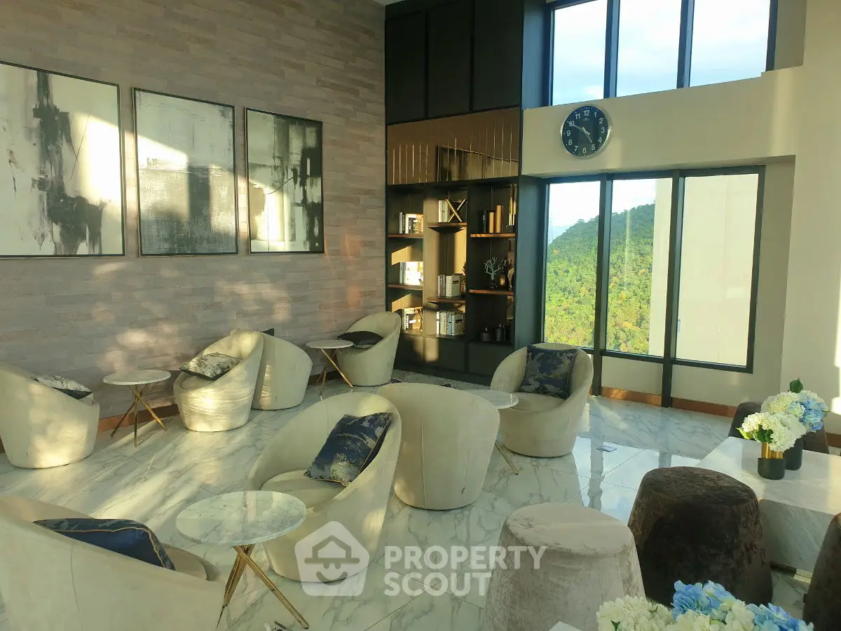Luxurious modern living room with panoramic windows and elegant decor