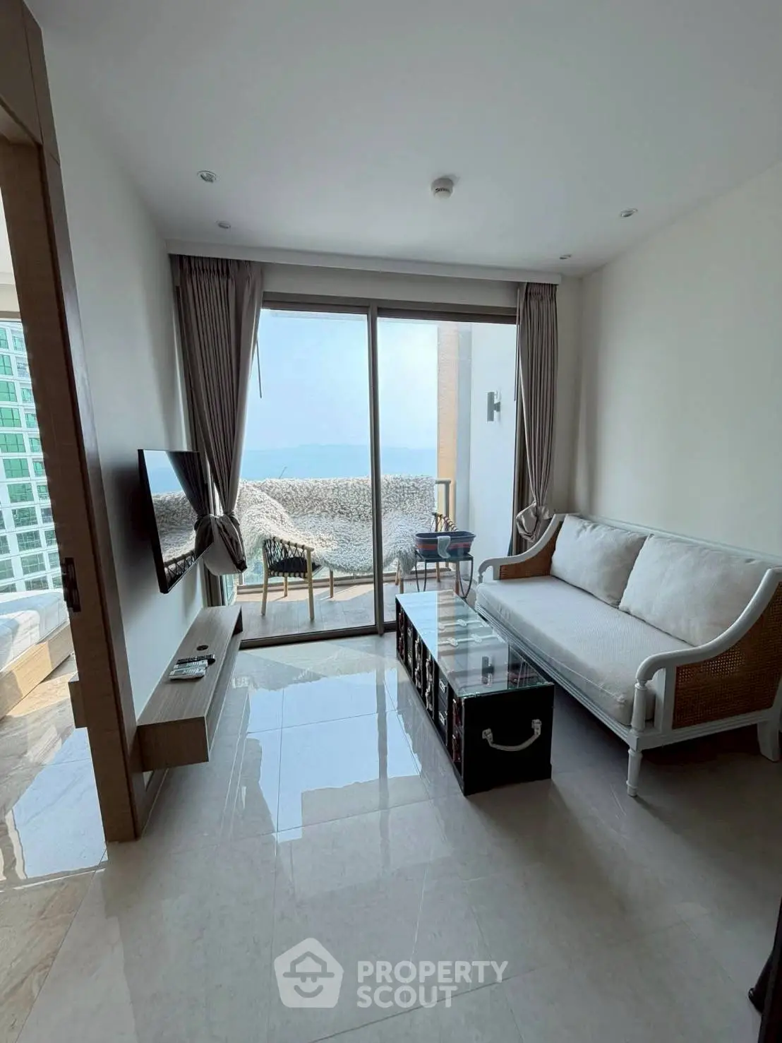 Modern living room with ocean view and sleek furnishings