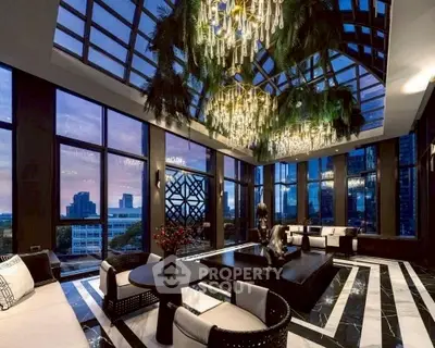 Luxurious penthouse living room with stunning city views and elegant chandeliers.