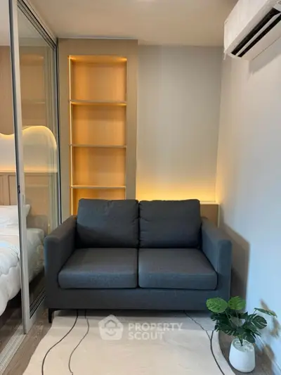 Modern cozy living room with stylish sofa and ambient lighting