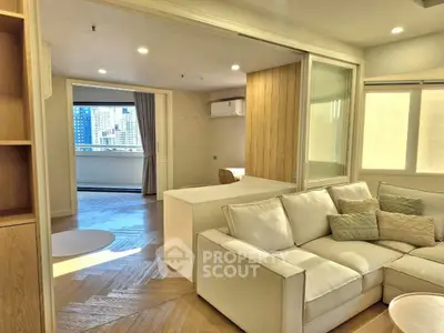 Spacious modern living room with city view and elegant decor