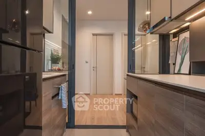 Modern kitchen with sleek cabinetry and open layout design