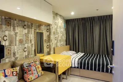 Modern studio apartment with stylish decor and cozy furnishings