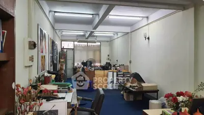 Spacious office space with ample natural light and organized layout, ideal for productivity and creativity.